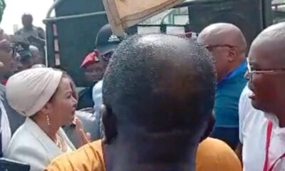 TENSION: Gunshot As Protesters Block Minister From Accessing Ministry In FCT