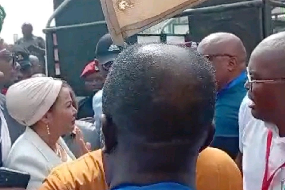 TENSION: Gunshot As Protesters Block Minister From Accessing Ministry In FCT